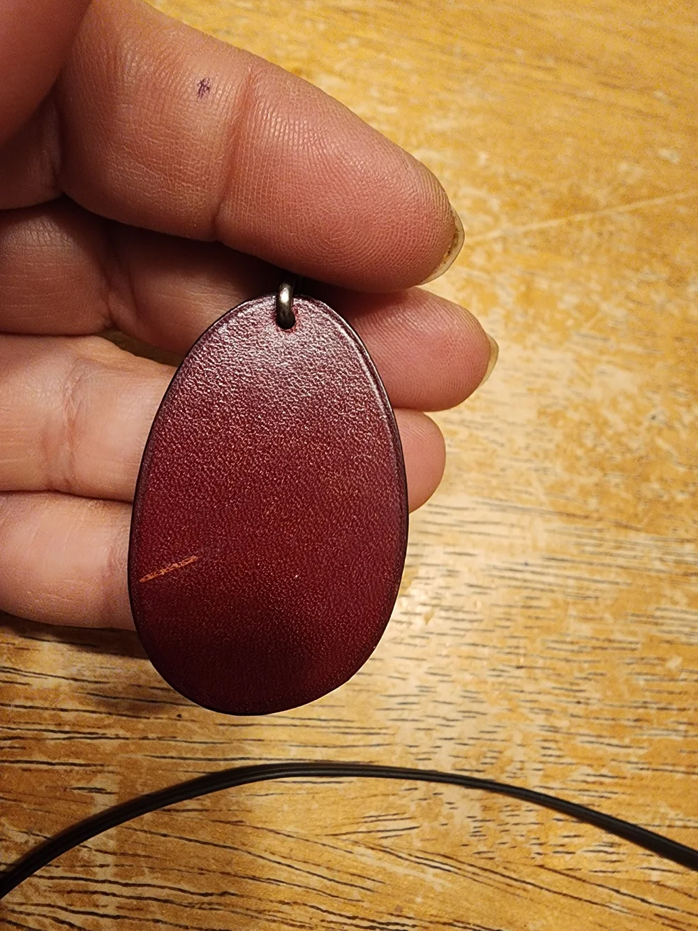 vintage Hermès leather plum fruit bag charm and keychain